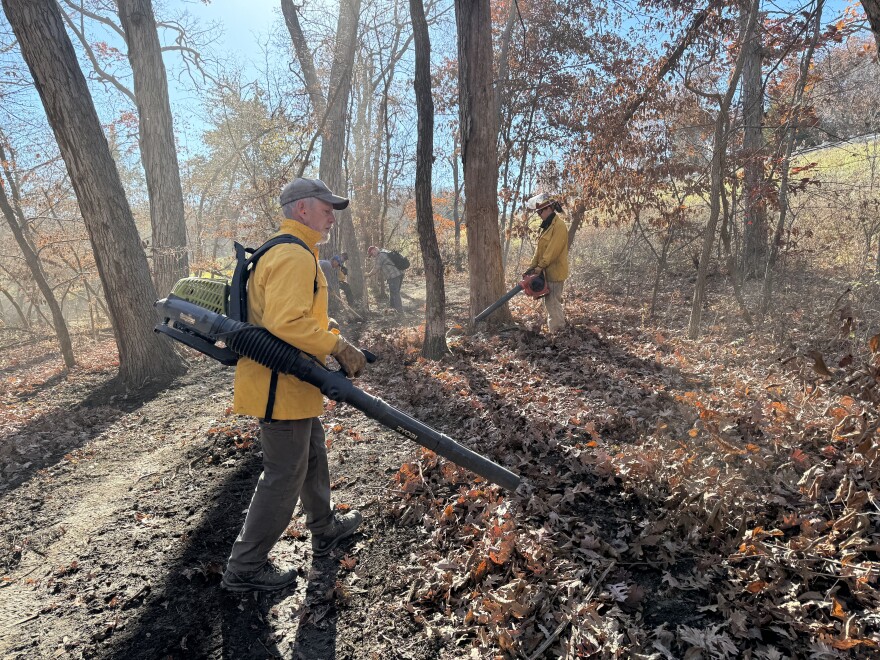 Before the fire, retired zoologist Bill Busby and others cleared an 8-foot wide path of bare soil to contain the flames.