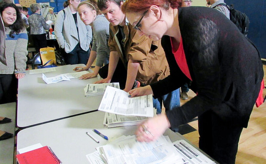 Precinct volunteers count caucus votes at Martin Luther King Jr. Elementary School in Seattle on Saturday, March 26. Democrats turned out across the state to support Bernie Sanders or Hillary Clinton.