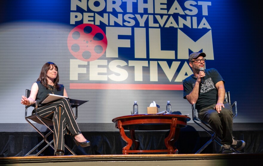 Julie Sidoni (left) conducting Q & A with filmmaker Josh Fox at the 2023 Northeast Pennsylvania Film Festival.