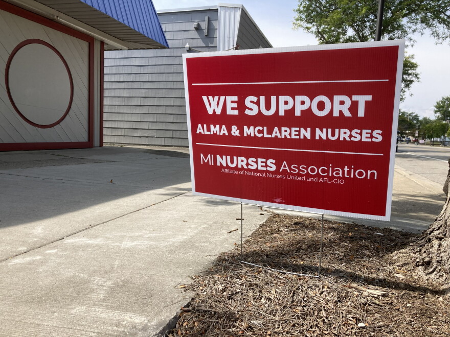 A "We support Alma nurses" sign sits in front of a house in Alma, Michigan.