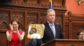 Lieutenant Governor Susan Bysiewicz (D) claps as Governor Ned Lamont delivers his State of the State address.