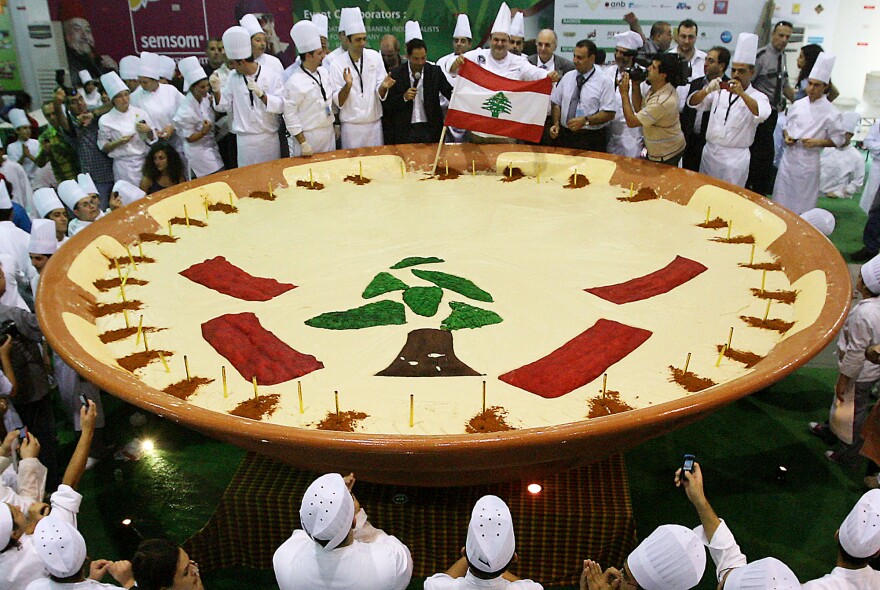 Lebanese chefs celebrate in Beirut after setting a new Guinness record for what was then the biggest tub of hummus in the world — weighing over 2 tons — in October 2009. The world record effort was part of Lebanon's bid to claim hummus as its own.