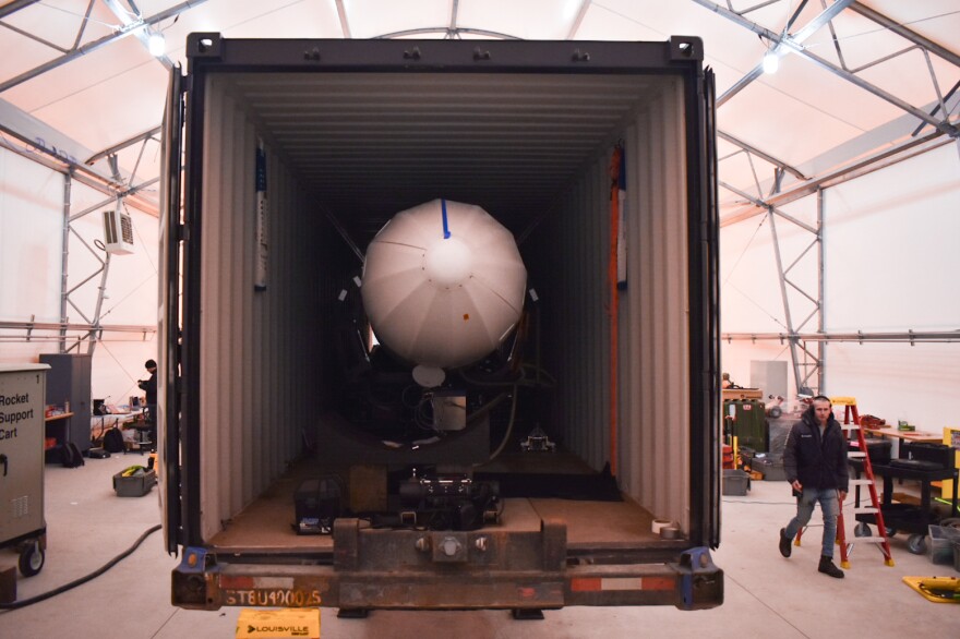 The nose of Astra’s Rocket, named “One of Three,” pokes out of a shipping container at the Pacific Spaceport Complex on February 21, 2020. (Photo by Kavitha George/KMXT)