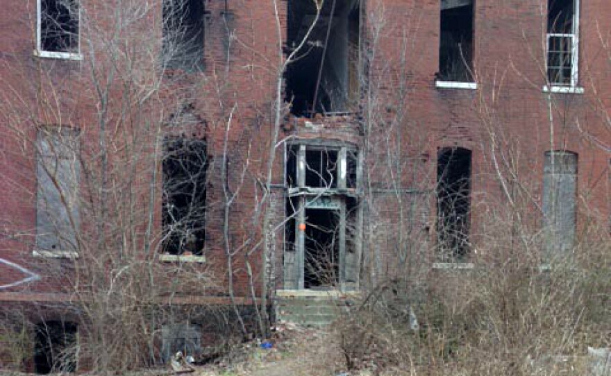 The back door of St. Mary's Infirmary shows some of the deterioration of the building.