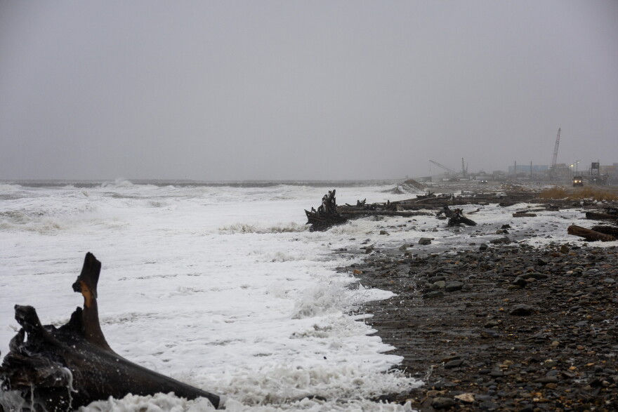 Waves, driftwood and foam cover the shore in Nome as a slow-moving Bering Sea storm pummeled the Western Alaska coast on Oct. 23, 2026.