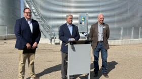 Fargo Mayor Josh Boschee, North Dakota Senator John Hoeven, and Executive Director of the Metro Flood Diversion Authority Jason Benson
