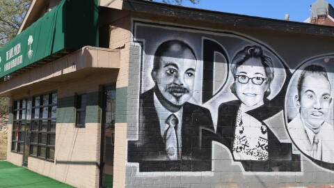 Billie and Alfred Caviel, pictured on the side of the pharmacy they operated at 19th Street and Avenue A for nearly 50 years, later reopened as the Caviel Museum of African American History in 2015.