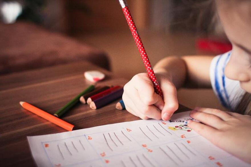 child at desk