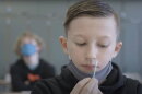 kid with swab