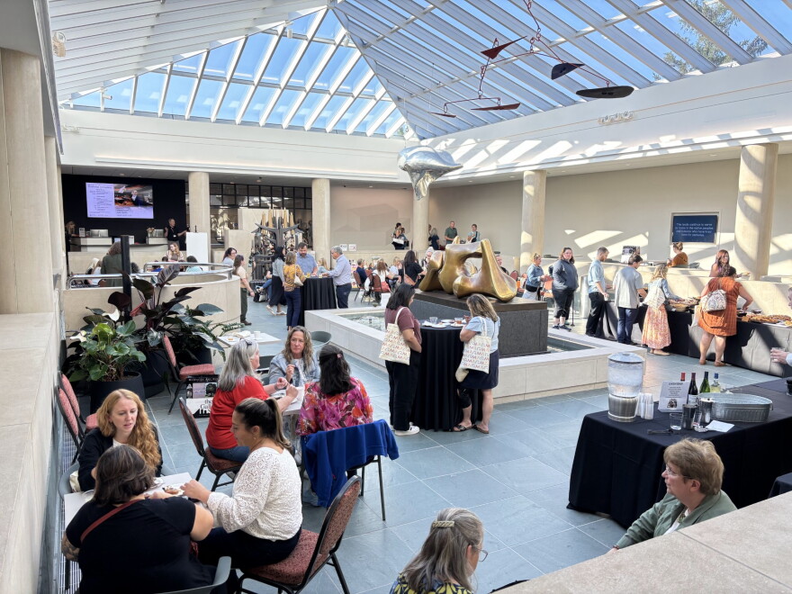 Local teachers gather and socialize during the Memorial Art Gallery's Teacher Open House. The MAG holds several educator-centered events per year to offer teachers appreciation and the opportunity to learn about the museum's free educational opportunities for students.