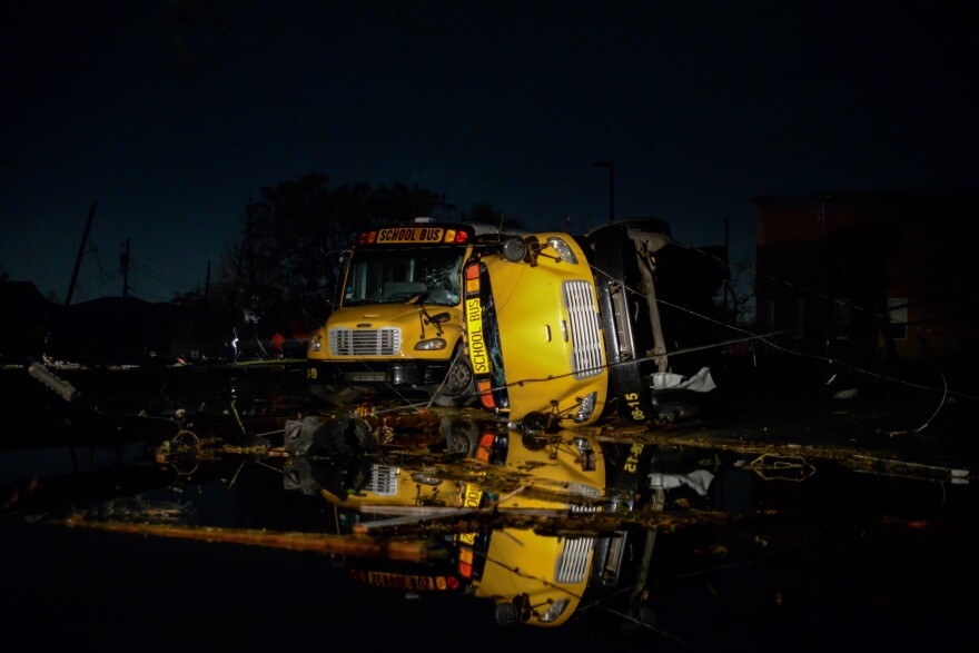 A tornado overturned school buses near Arabi Elementary School on Tuesday, March 22, 2022.