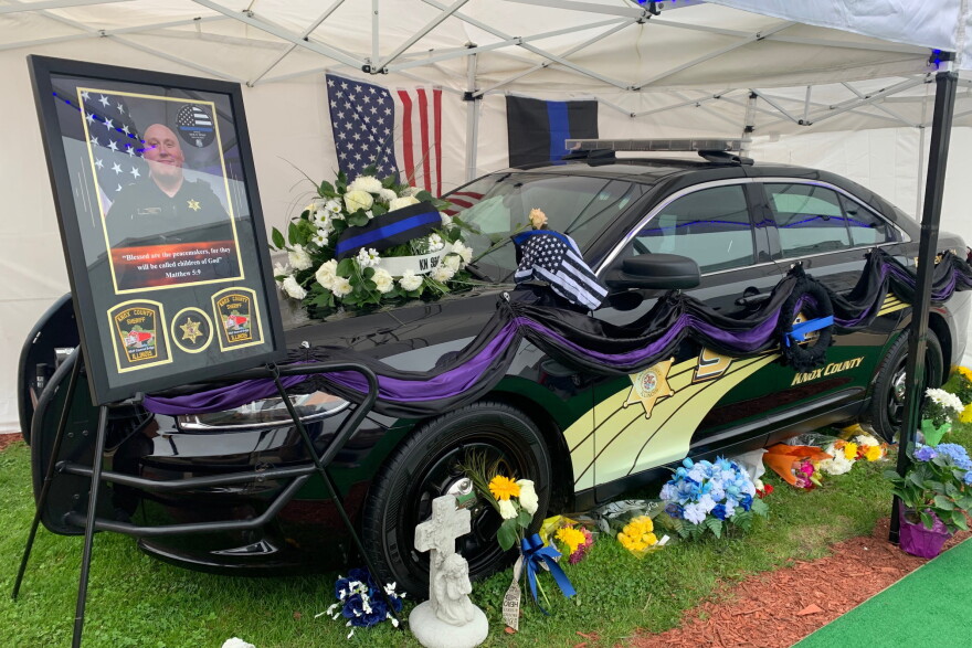  A memorial for Knox County Sheriff's Office deputy Nicholas D. Weist outside the Knox County Law Enforcement Center in Galesburg. Weist was killed in the line of duty on April 29. 
