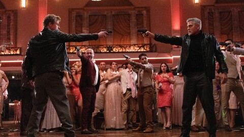 Brad Pitt and George Clooney in “Wolfs,” in theaters now and globally on Apple TV+ on September 27.