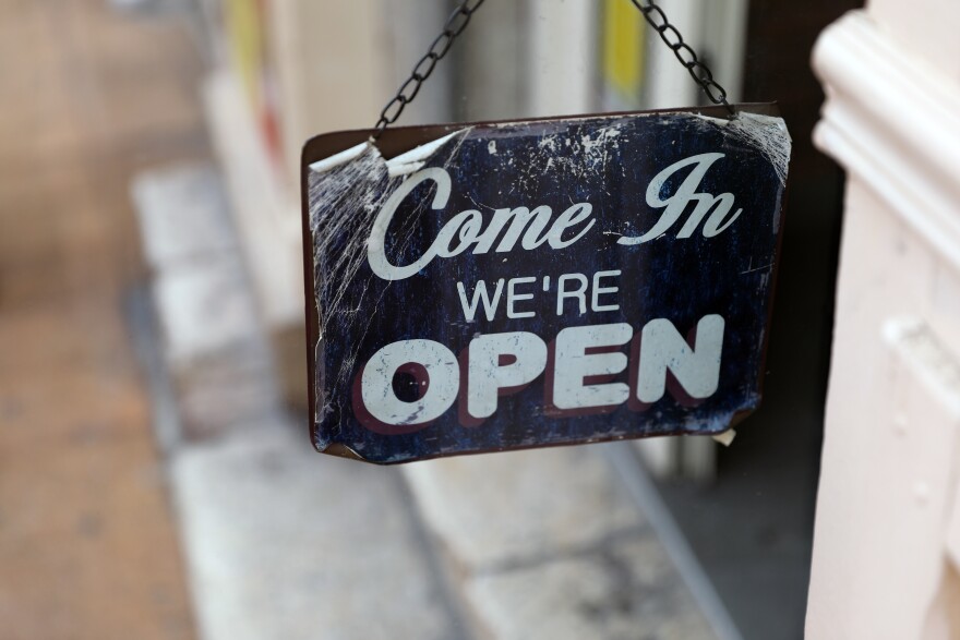 Small Tin sign hands down. It reads, "Come in, we're open."