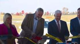 Gov. Eric Holcomb and other state officials cut the ribbon on a new scenario-based training village at the Indiana Law Enforcement Training Academy on Wednesday, Oct. 30, 2024, in Plainfield, Indiana.