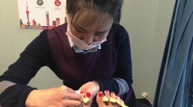 Shanghai pedicurist Ju-wen Zu and NPR's Aarti Shahani talk, aided by a translation app that may change the way we travel abroad forever.