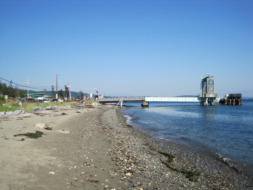 View of the Guemes Island ferry dock from the beach. The Guemes Island ferry is Skagit County's only ferry, with 20 runs a day. 