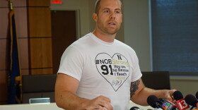 Seventh grade teacher Jason Seaman, who is credited with tackling the shooter at Noblesville West Middle School, speaks at a press conference Monday. (Eric Weddle/WFYI News)