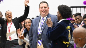 Agriculture teacher Jacob Ball is stunned to hear the big news: He has won a 2023-24 Kentucky Milken Educator Award, there's a $25,000 check with his name on it, and this whole assembly was put together to honor him! In addition to his work in the classroom, Ball created the school's Future Farmers of America (FFA) chapter and established a Junior MANRRS (Minorities in Agriculture, Natural Resources, and Related Sciences) chapter in partnership the University of Kentucky, his alma mater.