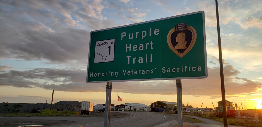 A sign for the Purple Heart Trail stands on the Homer Spit in Homer, Alaska. The sign is one of 22 built with the recent extension of the Purple Heart Trail.