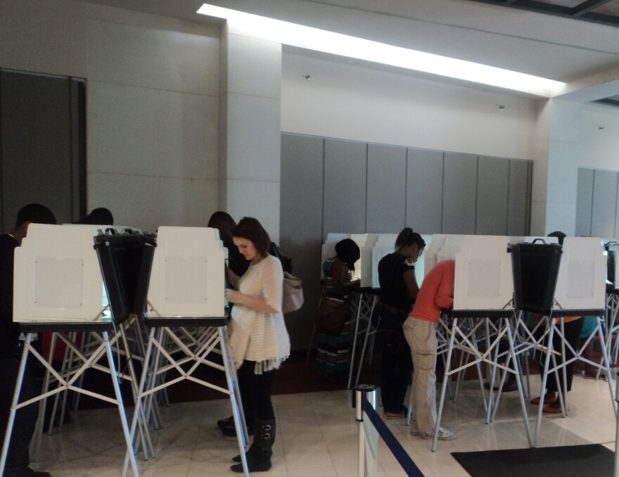 Voters cast their ballots (undated)