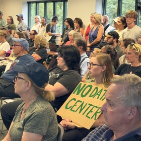 The Garfield Township Planning Commission meeting saw an overflow crowd as people voiced support for a possible temporary ban on data centers. (Photo: Vivian La/IPR News)