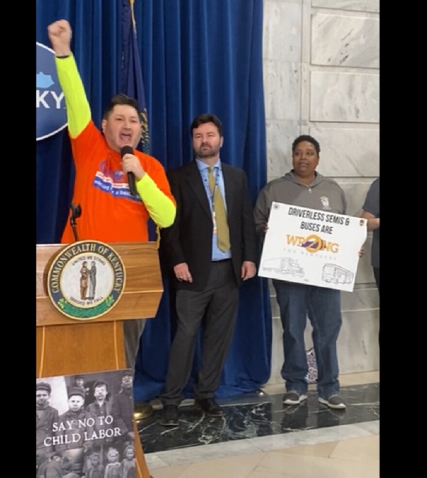 Tim Morris, executive director of the Greater Louisville Central Labor Council leading the rally in Frankfort