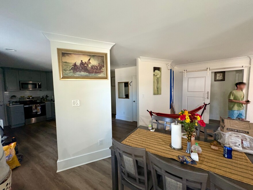 A framed picture of George Washington crossing the Delaware River hangs in the home of Enamorado's relatives.