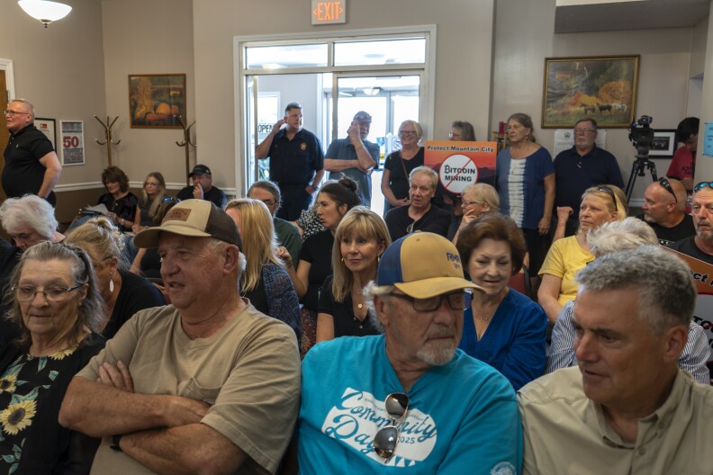 A packed room of 50 people at the Mountain City City Hall as seen on Thursday, Aug. 5, 2025. Residents showed out to voice criticism of plans to bring a 30 megawatt bitcoin mine to town.