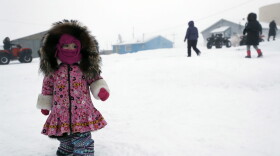 A girl waits for her mother on Jan. 19 in Toksook Bay, Alaska. The first Americans to be counted in the 2020 census starting Tuesday live in this Bering Sea coastal village. (Gregory Bull/AP)