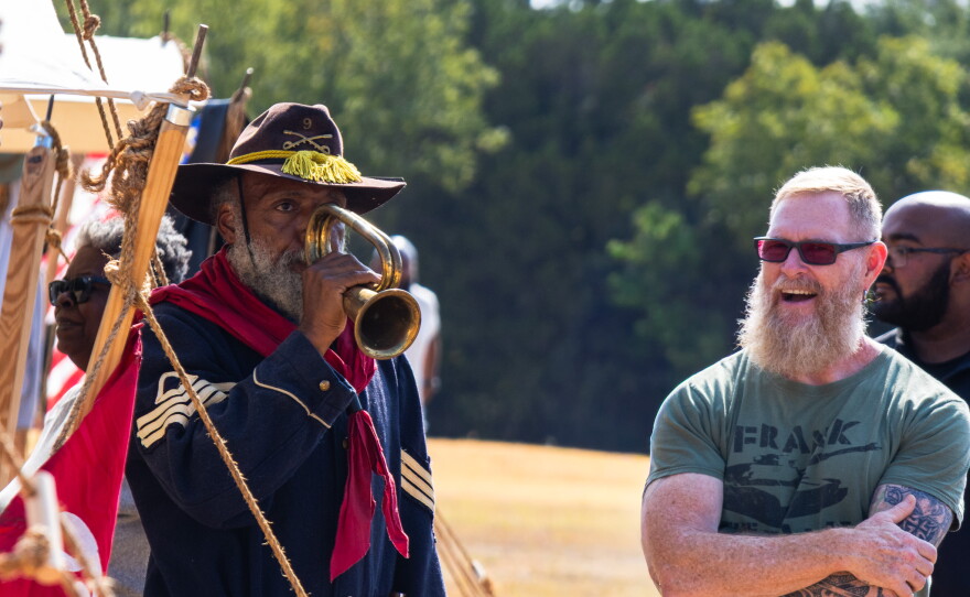 Buffalo Soldier reenactor playing bugle, photo by Alexander Brown.