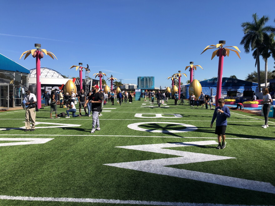 An AstroTurf field with fake palm trees is set up at Bayfront Park in downtown Miami for the Super Bowl Live event this week.