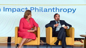 Jorge M. Perez, Chairman of the Related Group, and Jennifer O'Flannery Anderson, CEO of the Community Foundation of Broward, speak during a panel at the WLRN Sunshine Economy Summit in Fort Lauderdale on Sept. 23, 2026.
