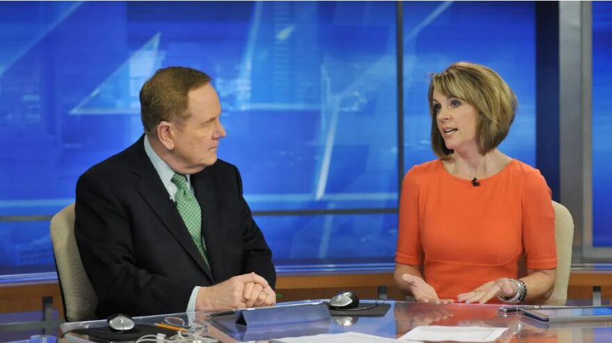 Anchors Tom Wills and Mary Baer on the set during a news broadcast at WJXT Channel 4 on Feb. 27, 2015. Baer is set to retire May 31.