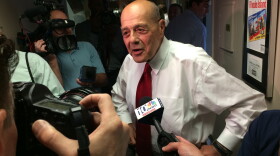 Buddy Cianci faces reporters after announcing his second comeback attempt, in 2014.