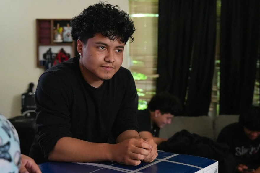 Jaime Pasillas visits with his aunt and cousin June 5, 2025, in Indianapolis.