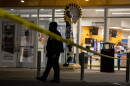 An officer stands guard at an entrance to the Stryker Sports Complex on Saturday evening, following an incident where a vehicle drove onto a field.