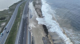 Nov. 17, 2024, aerial view of the dune breach at Delaware Seashore State Park (looking north). The SR-1 northbound lane is closed to vehicles and completely covered in ocean water, sand and debris.