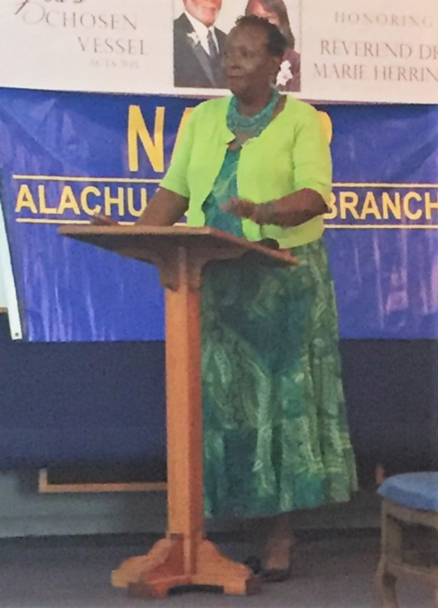 Evelyn Foxx, president of the Alachua County Branch of NAACP, moderates on Monday the community meeting held at Dayspring Missionary Baptist Church, 1945 NE 8th Ave. (Bria Wood/WUFT News)