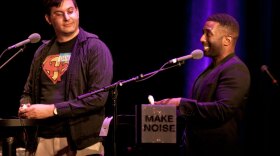 Film critic Wesley Morris (right) faces off against a fellow movie buff in front of a crowd at the Wilbur Theatre in Boston.