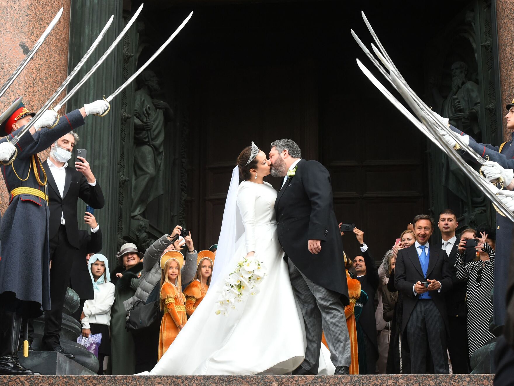 After a century of waiting, Russians witness a royal wedding once more