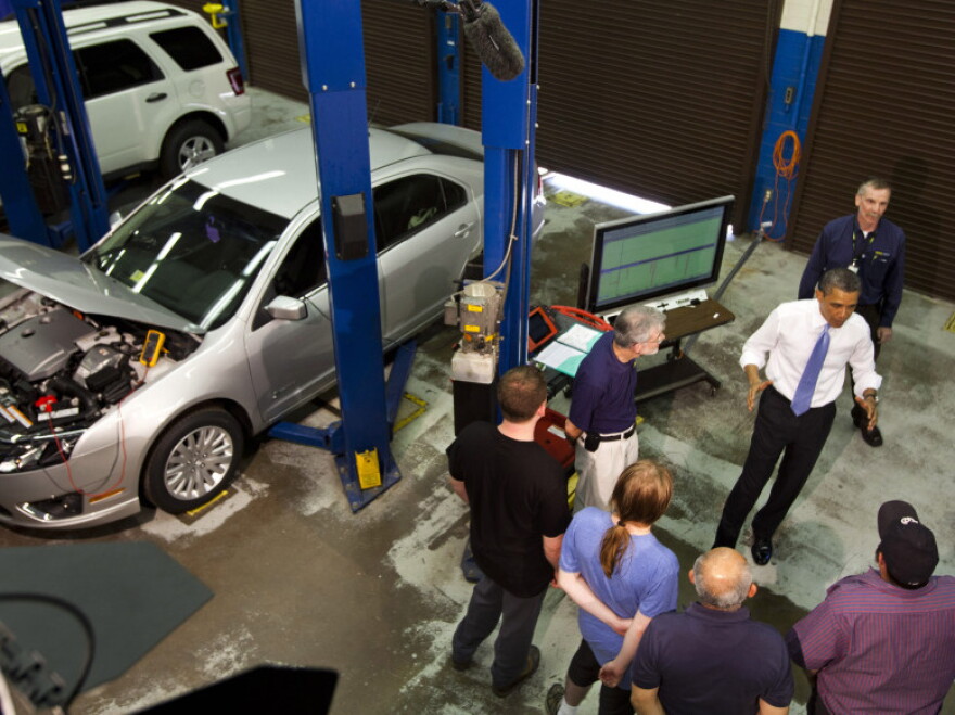 President Obama tours the Automotive Training Program at the Northern Virginia Community College, Alexandria campus, in June, Va. Slower economic growth means fewer opportunities for U.S. companies, which in turn leads to less hiring.