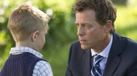 Colton Burpo (Connor Corum) tells Todd (Greg Kinnear) about heaven in <em>Heaven Is for Real</em>.