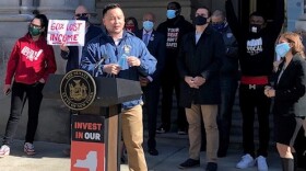 Assemblyman Ron Kim, a Queens Democrat, spoke at a rally to celebrate the inclusion of new taxes on the wealthy and increased school funding in the state budget, at a rally outside the State Capitol on April 7, 2021.