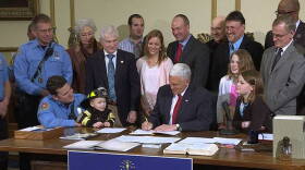 Gov. Mike Pence signs the "Right to Try" legislation into law.