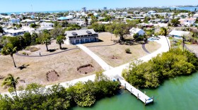 The Mound House was built atop a Calusa shell mound. Archaeologists believe the mound's elevation helped protect the historic home from powerful storm surges that inundated many parts of Fort Myers Beach in recent years.