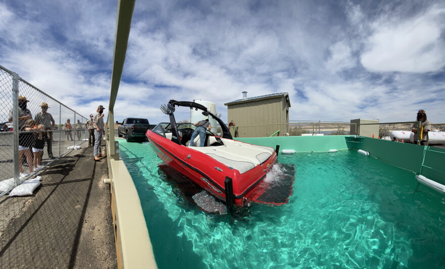similar to a boat launch, all the driver has to do is back their vehicle into the diptank and let it run.