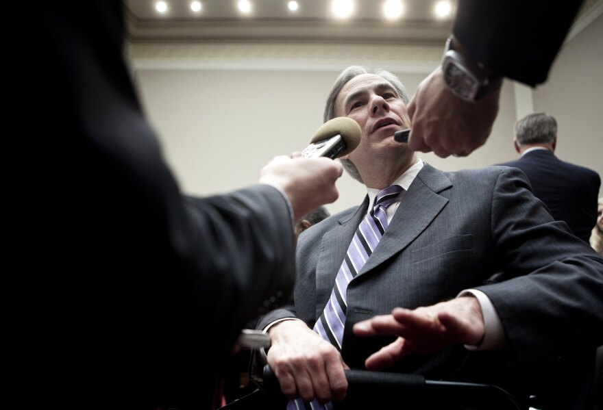 Texas Attorney General Greg Abbott speaks to reporters 2011.