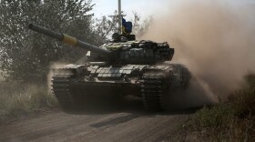 A Ukrainian tank rolls down a road at a position along the front line in the Donetsk region on Aug. 15, 2022, amid Russia's invasion of Ukraine. (Anatolii Stepanov/AFP via Getty Images)