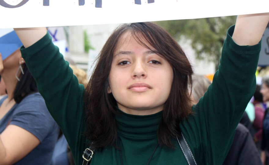 Erol Morgan, 16 holds up a sign at San Antonio's March For Our Lives Mar. 24. She's a student at North East School of the Arts at L.E.E. High School.